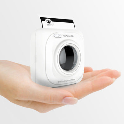 Compact Paperang printer with paper roll and mobile app